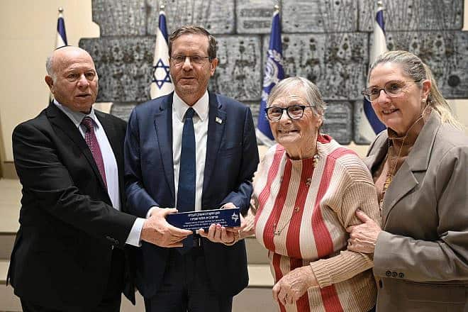 Kindertransport and Oct. 7 survivor Mirjam Szpiro with President Isaac Herzog and first lady Michal Herzog, and chairman of the International March of the Living Shmuel Roseman, in Jerusalem on Jan. 24, 2024. Photo by Haim Zach/GPO.