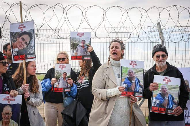 Relatives of Israelis held hostage by Hamas terrorists attend a protest near the border with Gaza calling for their release, Jan. 11, 2024. Credit: Flash90.