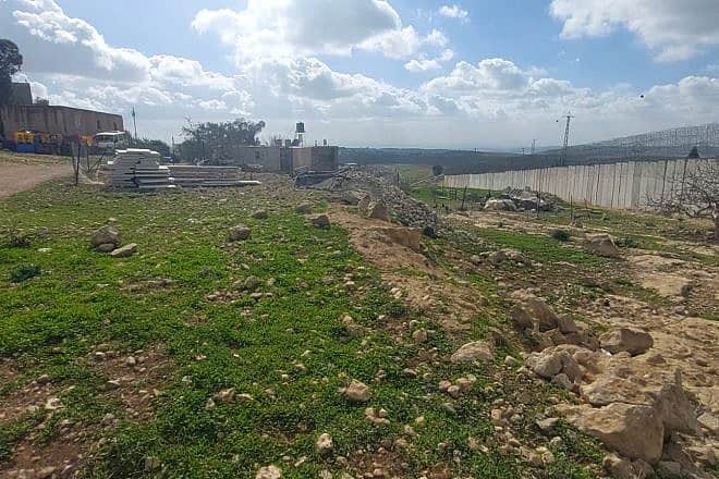 Illegal Arab construction at the security barrier near Al-Ramadin in Judea. Photo: Courtesy.