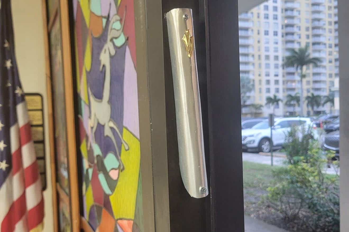 Young Israel of Sunny Isles Beach has installed the pictured mezuzah crafted from a piece of a missile intercepted by the Iron Dome. Photo courtesy of Young Israel of Sunny Isles Beach.