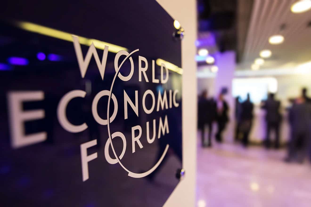 Emblem of the World Economic Forum in Davos, Switzerland. Credit: Drop of Light/Shutterstock.