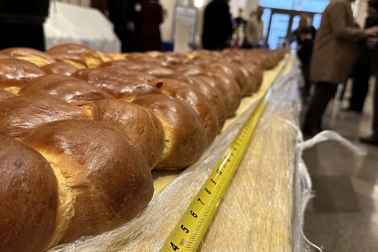 A Jewish school enlists the support of a community in the attempt to beat an existing record and make the longest challah, Jan. 19, 2024. Credit: Courtesy of Congregation Rodeph Sholom.