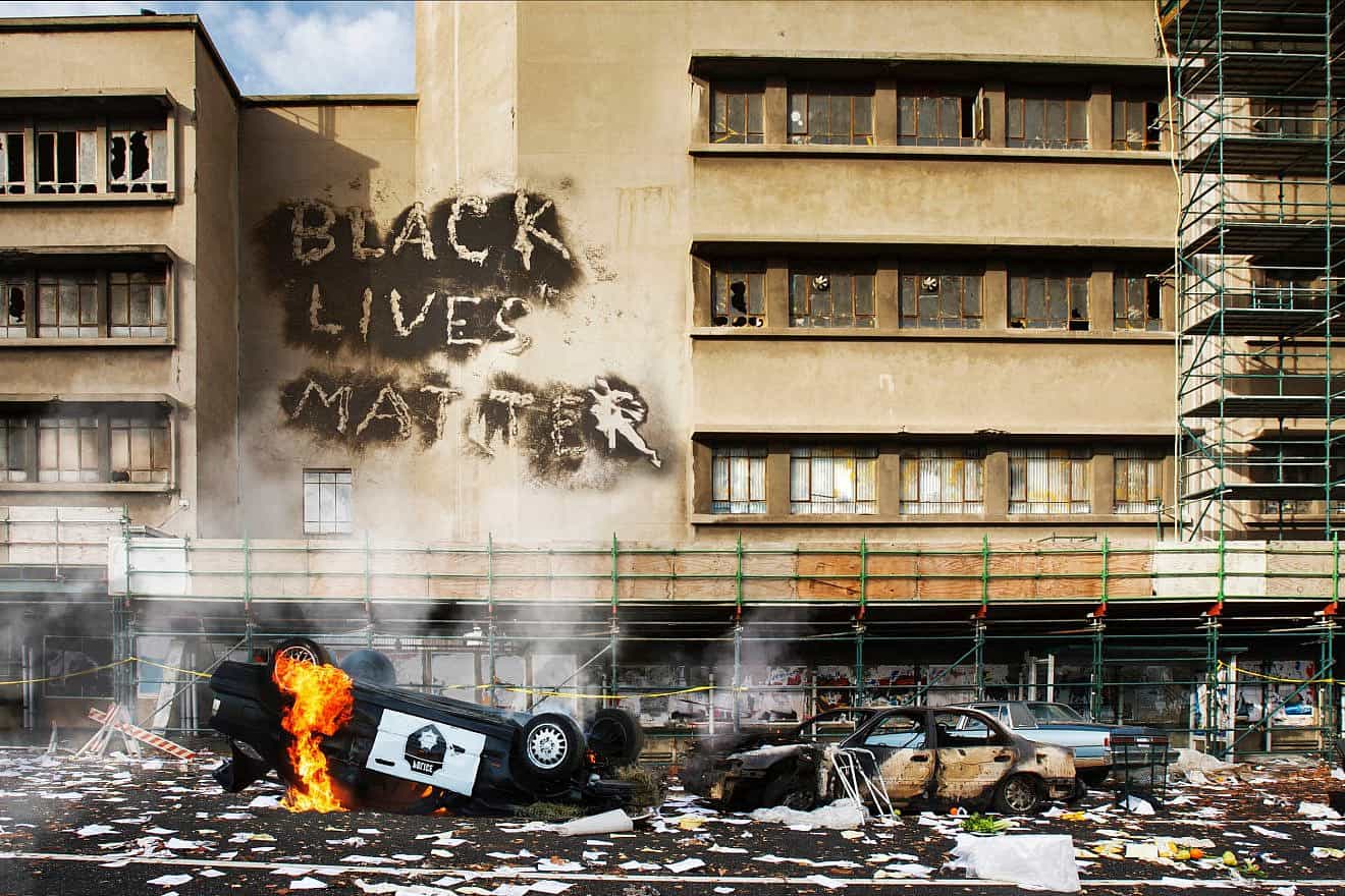 Black Lives Matter graffiti in the aftermath of a riot. Source: Zorro Stock Images/Shutterstock