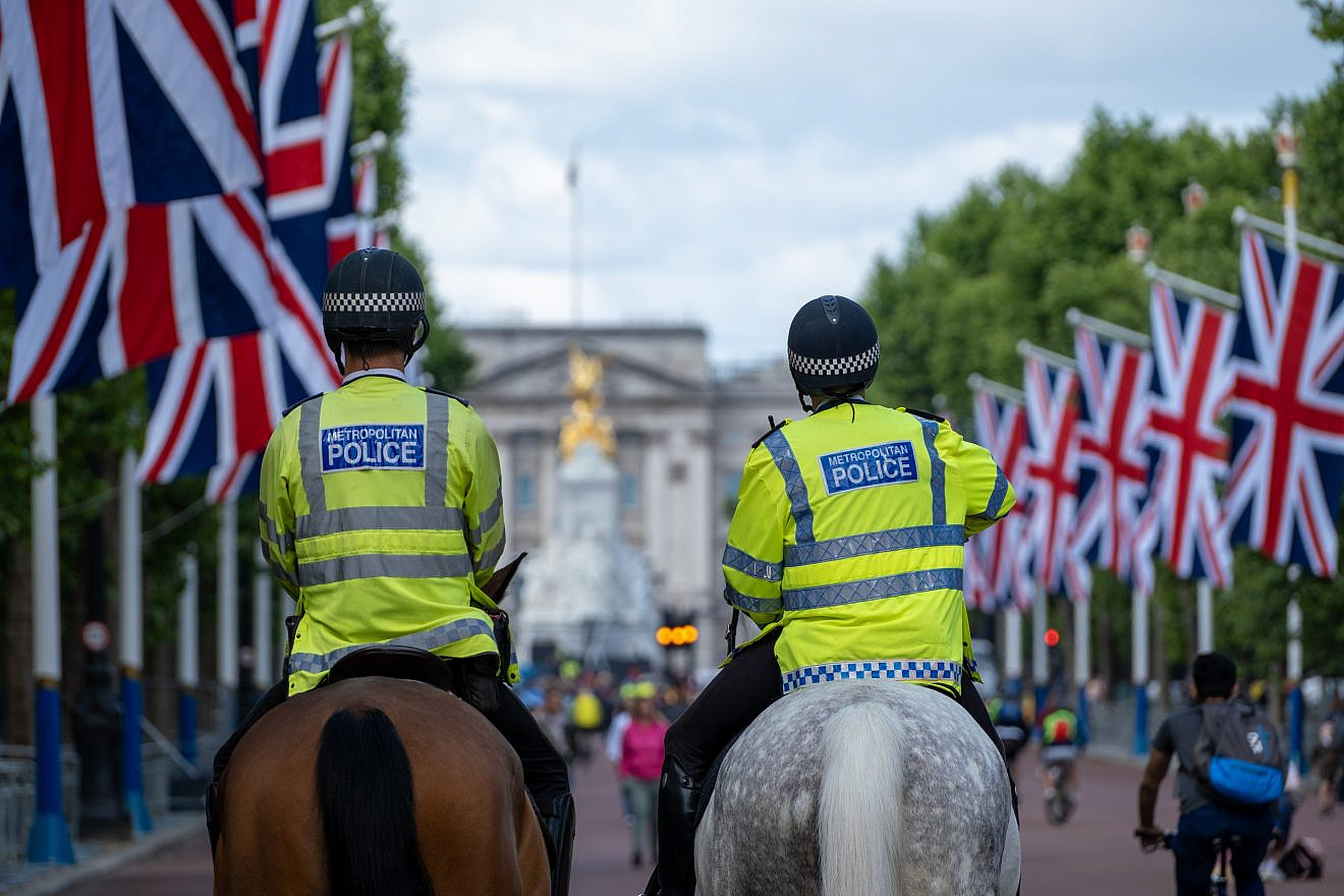Metropolitan police officers in London. Credit: Watcharisma/Shutterstock.