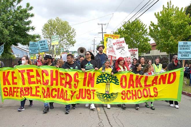 Hundreds of teachers, parents and supporters march at a strike rally in Oakland, Calif. on May 8, 2023. Credit: Sheila Fitzgerald/Shutterstock.