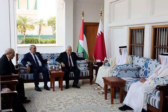 Palestinian Authority chief Mahmoud Abbas meets Emir of Qatar Sheikh Tamim bin Hamad Al Thani in Doha, Feb. 12, 2024. Photo by Thaer Ghanyem/Wafa.