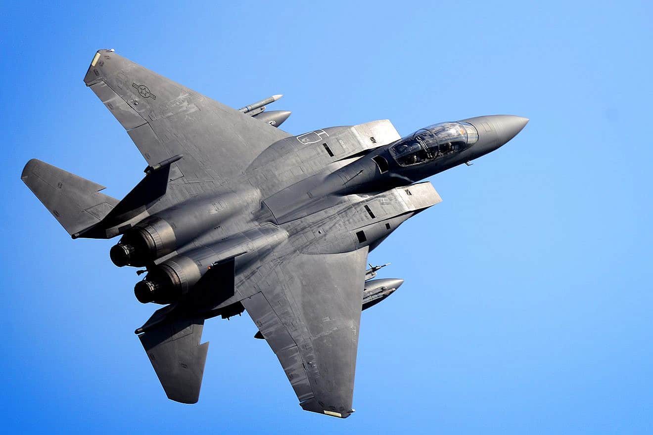 An F-15E Strike Eagle assigned to the 492nd Fighter Squadron performs a high-speed pass over RAF Lakenheath, England, April 10, 2019. Credit: Tech. Sgt. Matthew Plew/U.S. Air Force.