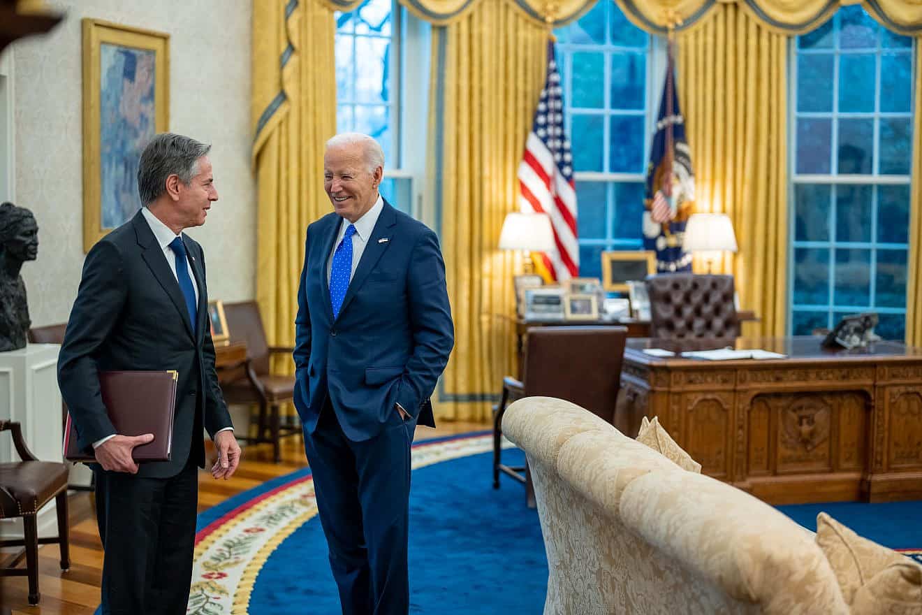 President Joe Biden talks with Secretary of State Antony Blinken after a meeting with Chancellor Olaf Scholz of Germany in the Oval Office, Feb. 9, 2024. Photo by Adam Schultz/White House.