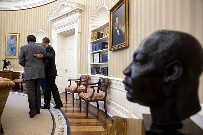Clarence B. Jones, a visiting professor at the University of San Francisco and scholar writer in residence for the Martin Luther King Jr. Research & Education Institute, with former President Barack Obama meets in the Oval Office of the White House on Feb. 2, 2015. Jones worked with King on the “I Have a Dream” speech. Credit: Official White House Photo by Pete Souza.
