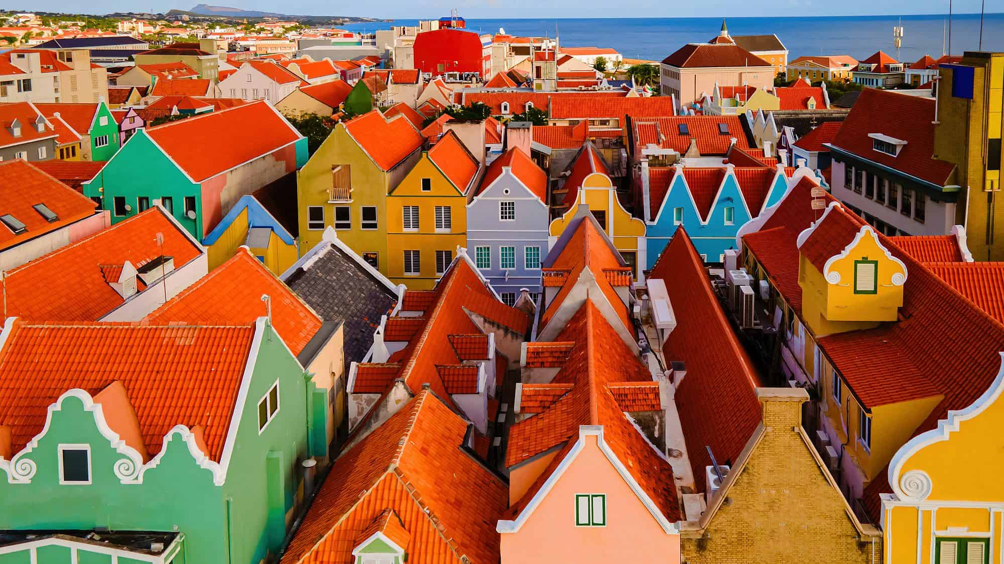 The colorful homes and buildings in Willemstad, the capital of Curaçao, in the Dutch Antilles. Credit: Fokke Baarssen/Shutterstock.