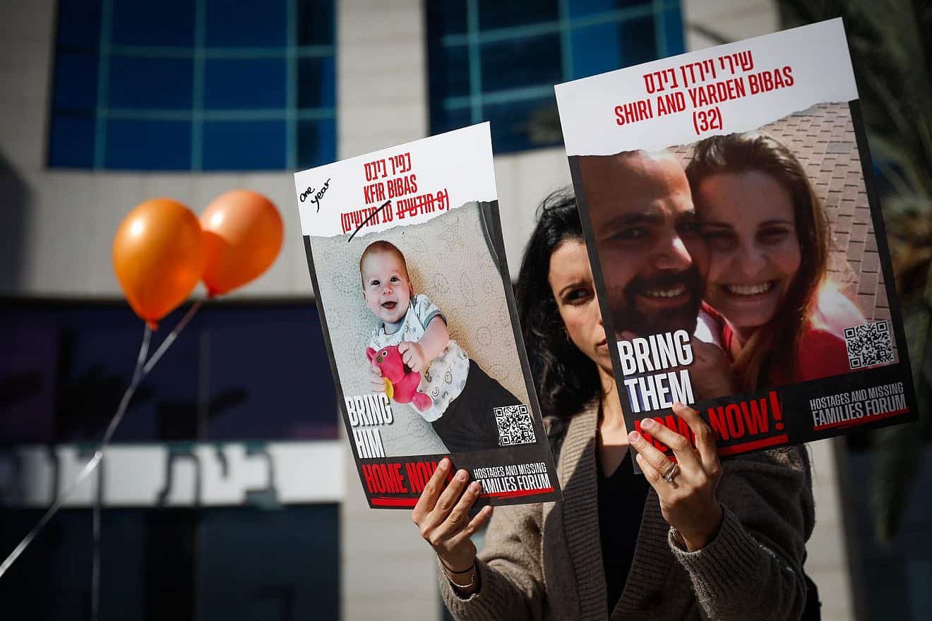 Israelis protest for the release of civilians held hostage in the Gaza Strip, outside the Red Cross offices in Tel Aviv, Jan. 18, 2024. Photo by Miriam Alster/Flash90.