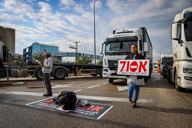 People block the entrance to Ashdod port during a protest against aid trucks entering the Gaza Strip, in Ashdod, southern Israel, Feb. 1, 2024. Photo by Chaim Goldberg/Flash90.