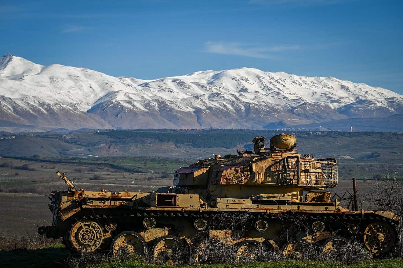 A view of the snow-covered peaks of the Israeli and Syrian Hermon mountain range, along the Golan Heights, on Feb. 8, 2024. Photo by Michael Giladi/Flash90.
