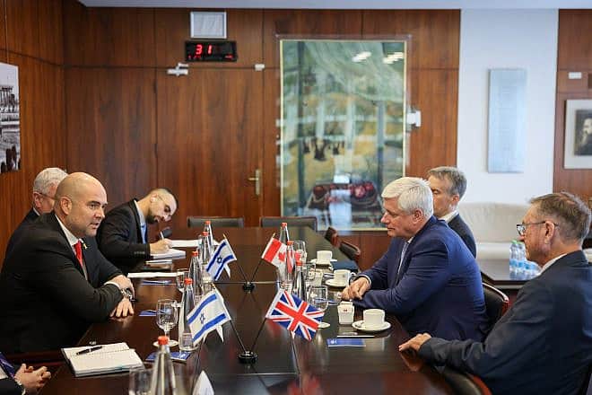 Former Canadian prime minister Stephen Harper (right), sits across the table from Knesset Speaker Amir Ohana in Jerusalem on Feb. 18, 2024. Source: X.