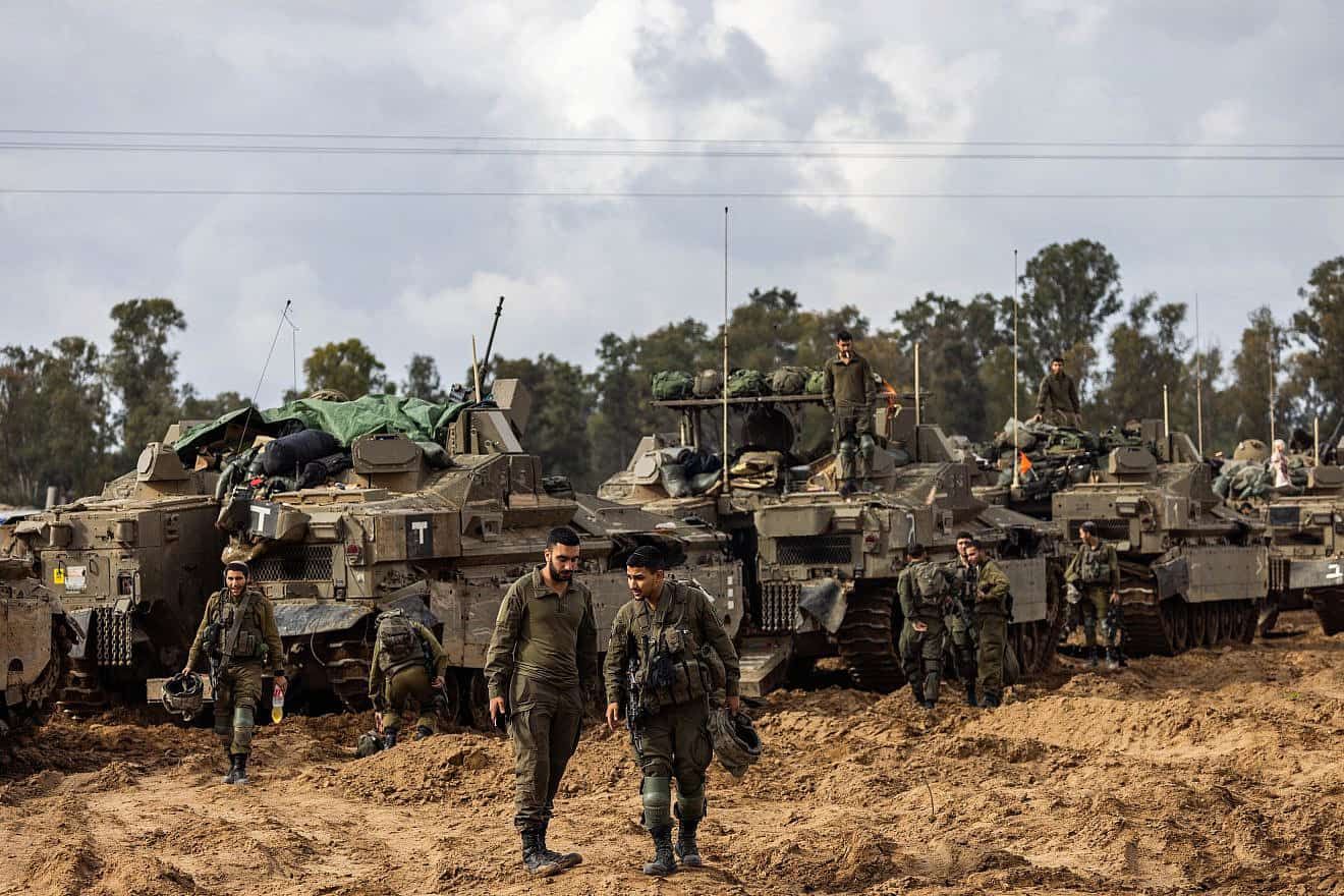 Israeli soldiers near the border fence with the Gaza Strip, Jan. 14, 2024. Photo by Chaim Goldberg/Flash90.