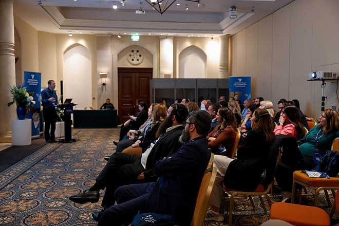 Dr. Hananel Rozenberg delivers an address at the Yael Foundation conference in Cyprus, Mon. Feb 19, 2024. Credit: Nataliia Jeanvie.