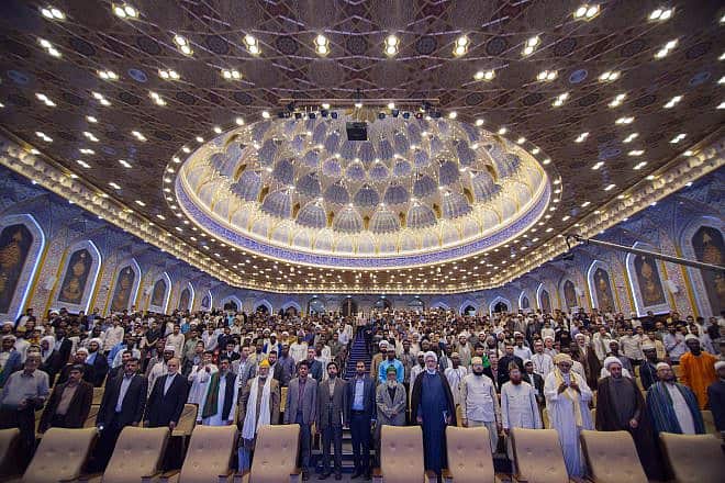 The International Quran Competition for Students of Islamic Seminary Schools at Al-Mustafa International University in Qom, Iran. Photo by Mostafameraji via Wikimedia Commons.