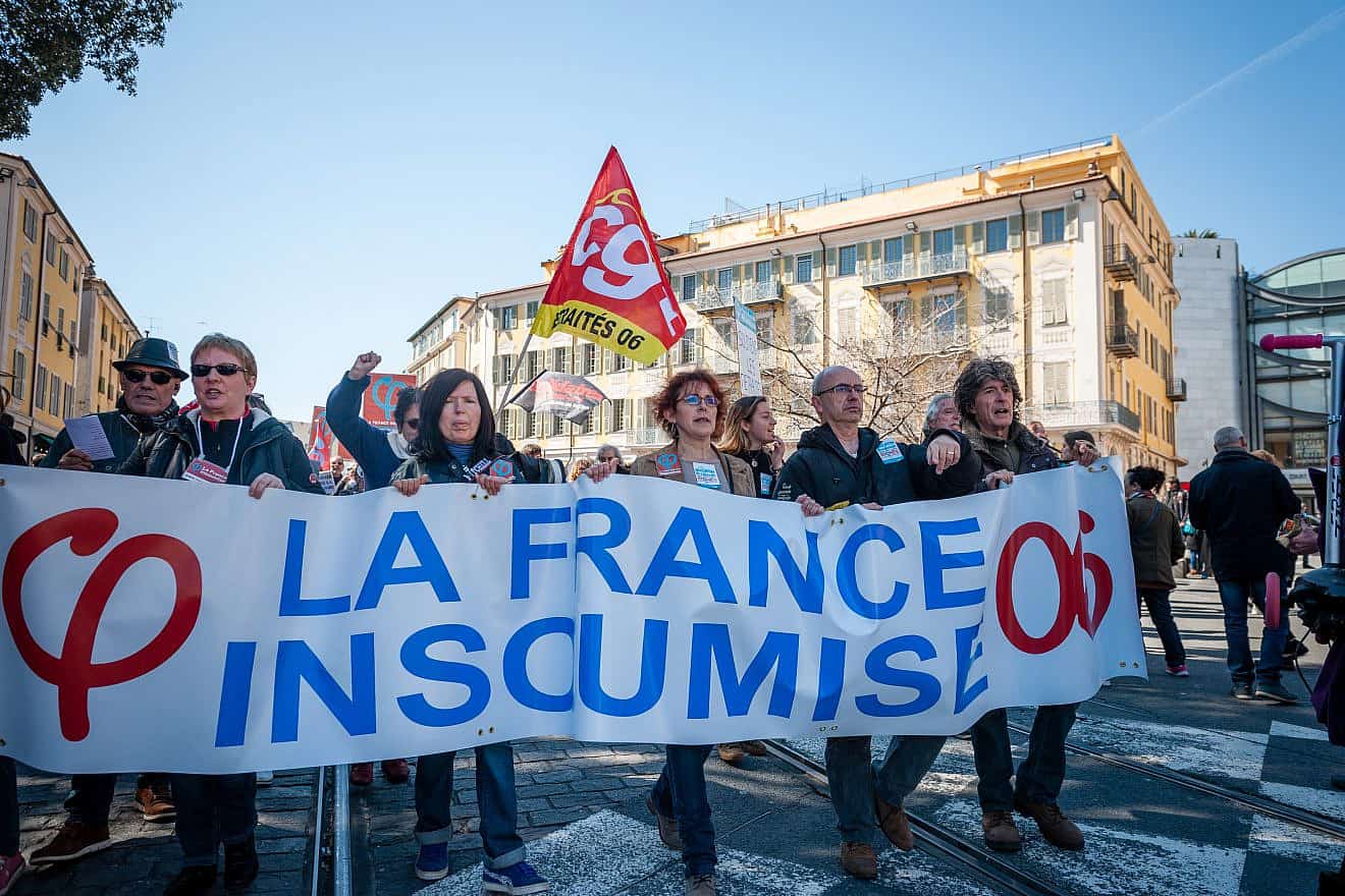 Protesters associated with the far-left group La France Insoumise demonstrate Nice, in the south of France, against governmental reform in 2018. Credit: Frederic Dides/Shutterstock.