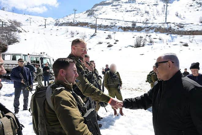 Israeli Prime Minister Benjamin Netanyahu visiting soldiers stationed on Mount Hermon, Feb. 22. 2024. Photo by Amos Ben-Gershon/GPO.