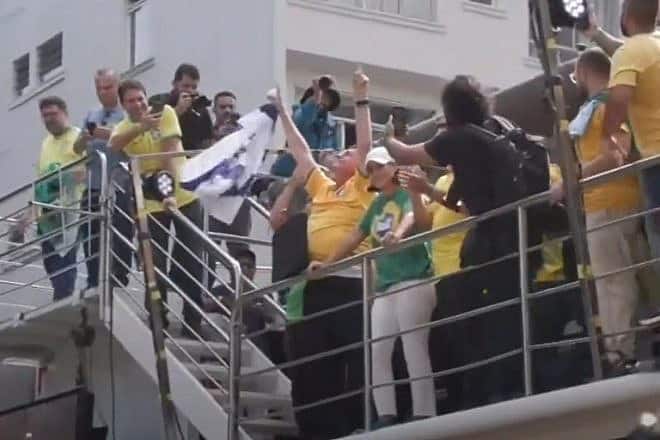 Former Brazilian President Jair Bolsonaro waves an Israeli flag at a rally in Sao Paolo, Brazil, on Feb. 25, 2024. Source: Screenshot.