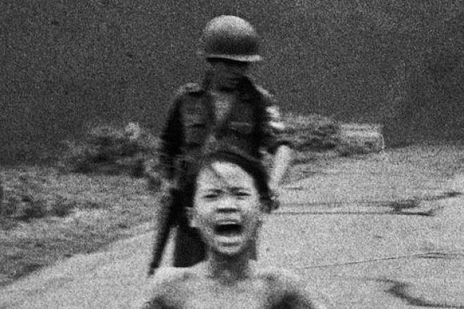 The iconic 1972 photograph showing Phan Thi Kim Phuc running down a road near Trảng Bàng, Vietnam, following a napalm strike. Photo by Nick Ut via Wikimedia Commons.