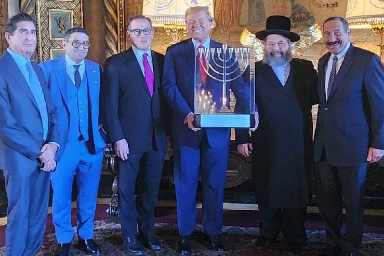 Former U.S. President Donald Trump receives an award from the Israel Heritage Foundation, Feb. 26, 2024. Credit: IHF.