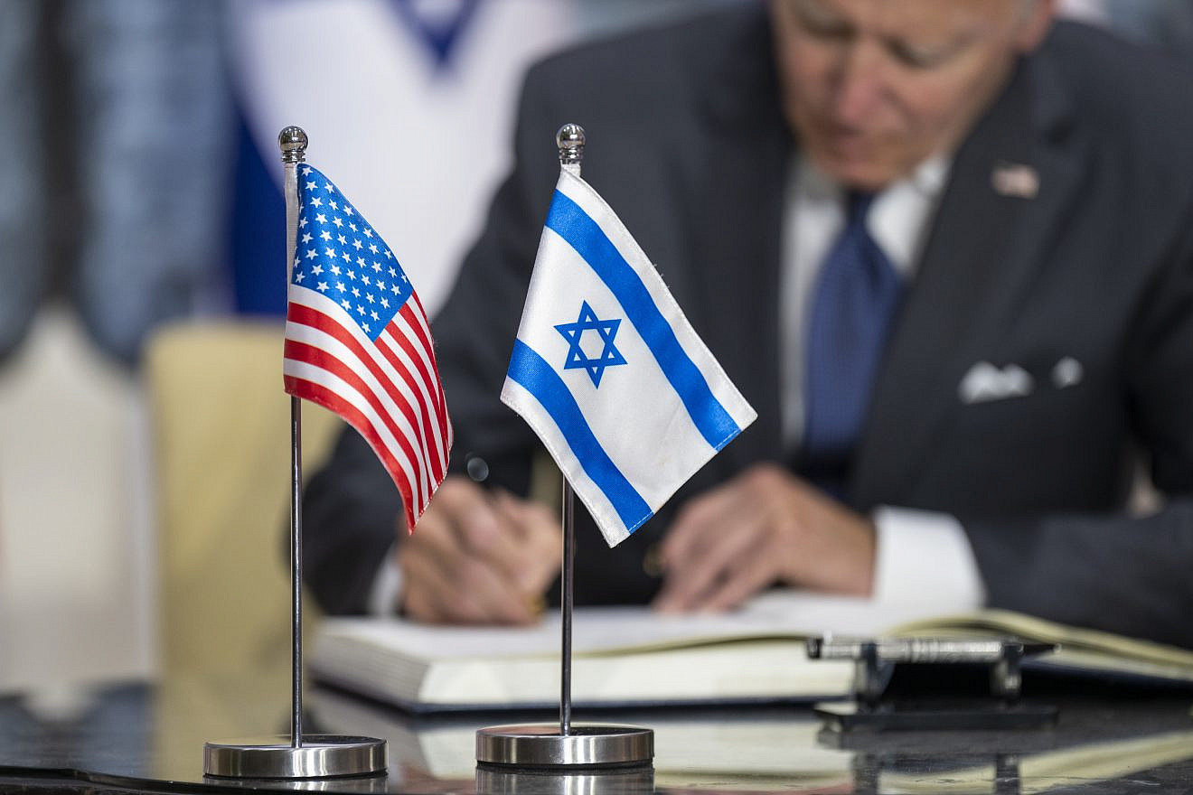 U.S. President Joe Biden signs the guestbook at the Israeli president's residence in Jerusalem on July 14, 2022. Credit: Adam Schultz/White House.