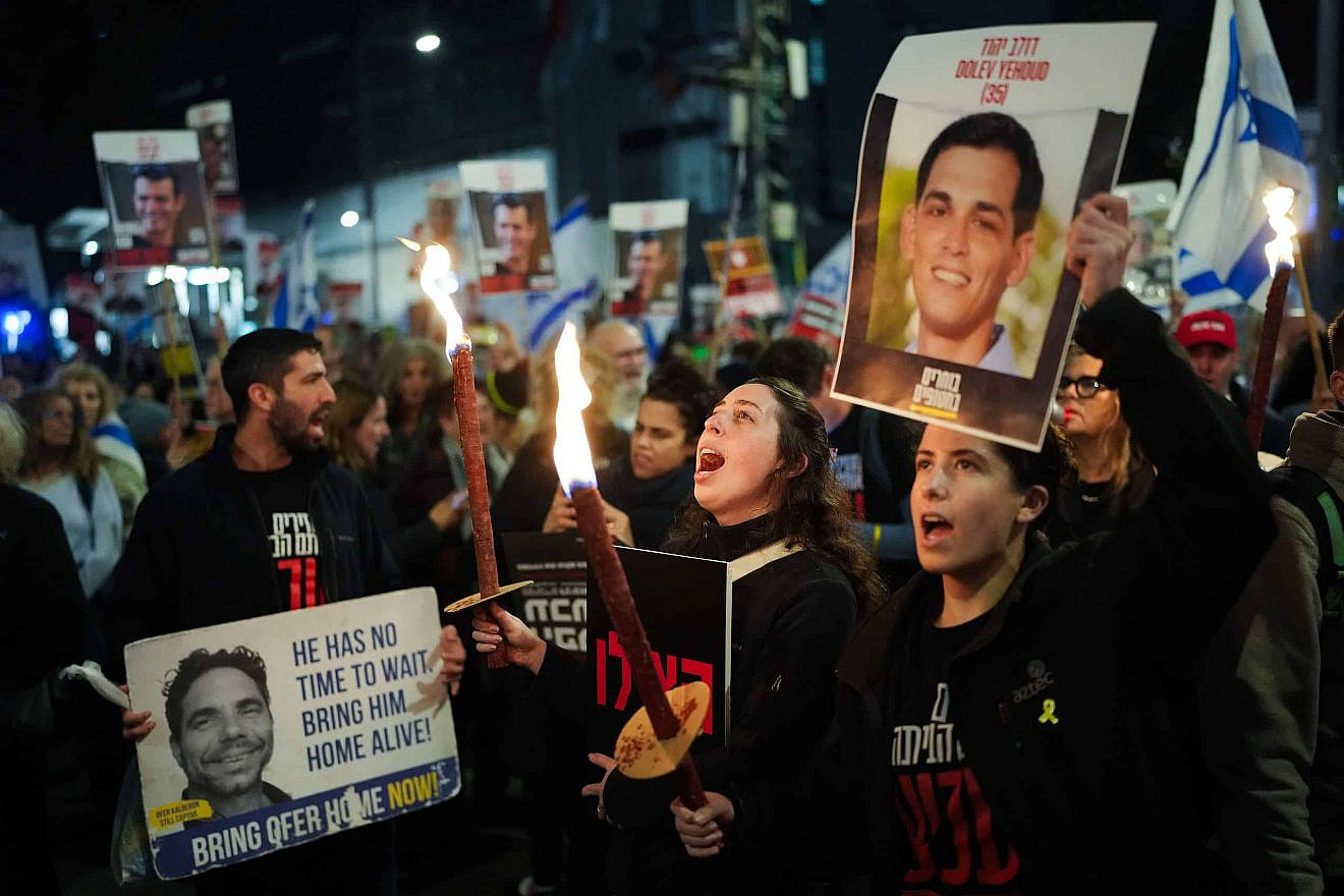 Israelis protest outside the Kirya military headquarters in Tel Aviv, calling for the release of hostages held in the Gaza Strip and the replacement of the Netanyahu government, March 23, 2024. Photo by Erik Marmor/Flash90.