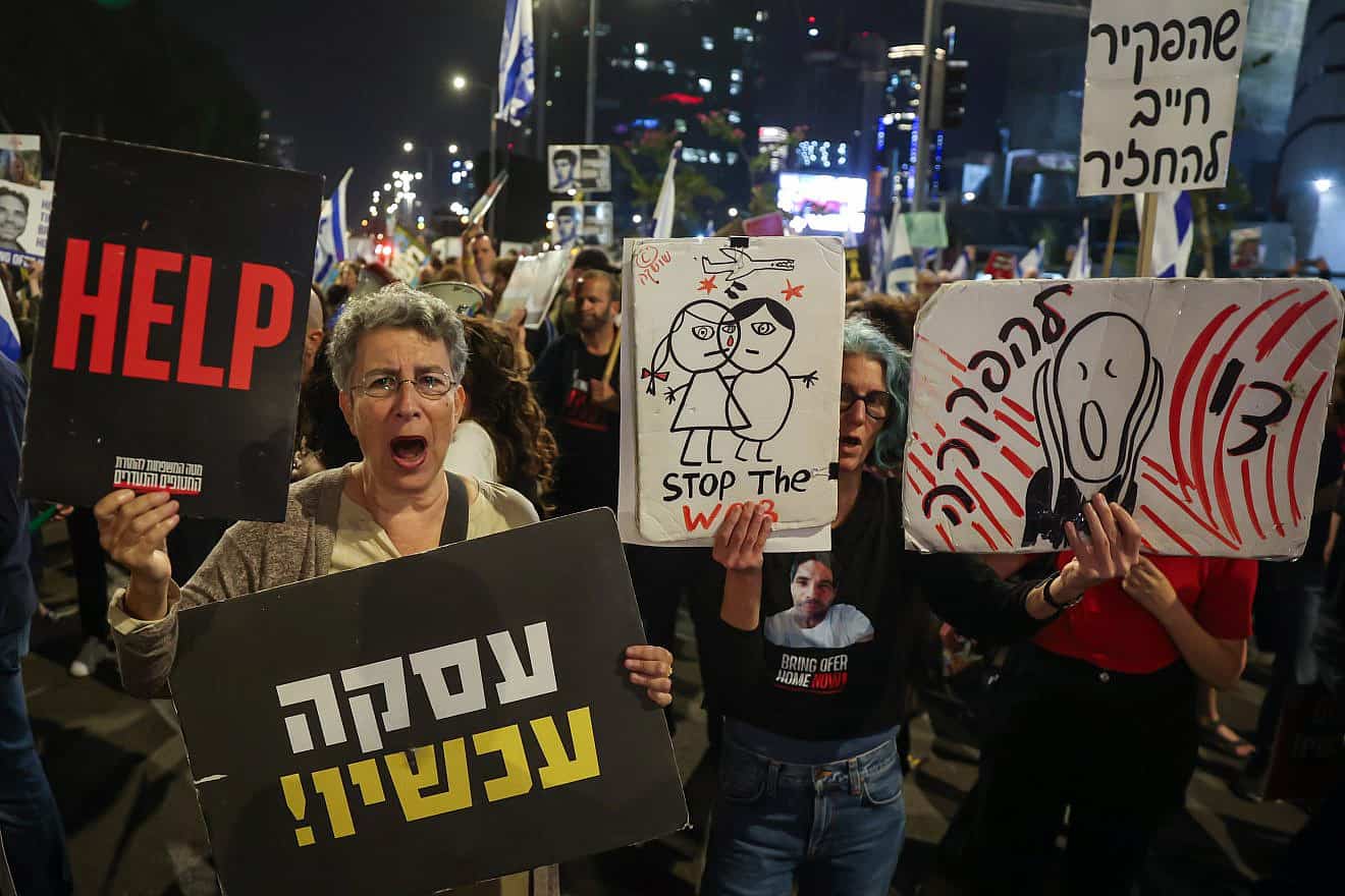 Protesters at Defense Ministry headquarters in Tel Aviv call for the ouster of Prime Minister Benjamin Netanyahu and the immediate release of the hostages held in Hamas captivity, March 30, 2024. Photo by Itai Ron/Flash90.