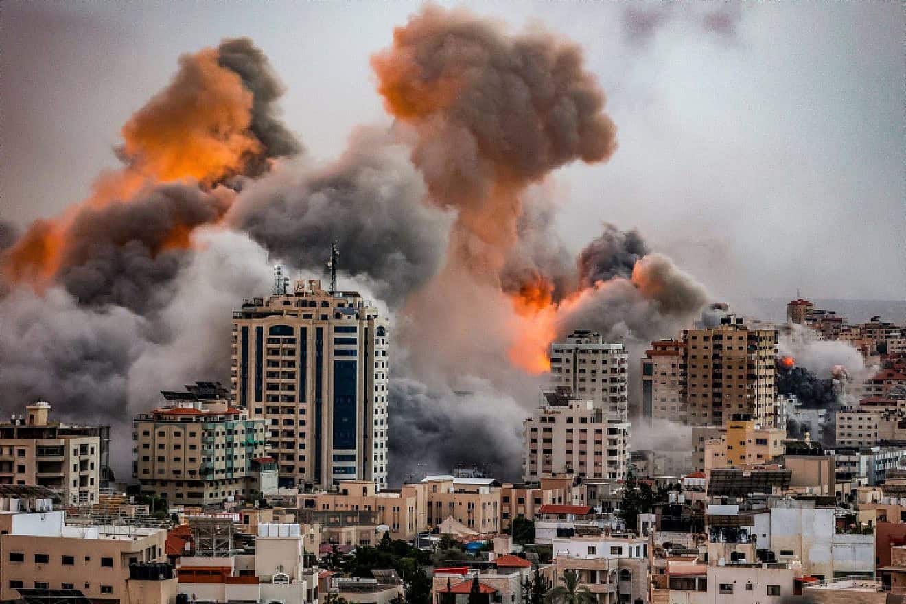 A ball of fire and smoke rises during an Israeli airstrike in the Gaza Strip, Oct. 9, 2023. Photo by Atia Mohammed/Flash90.
