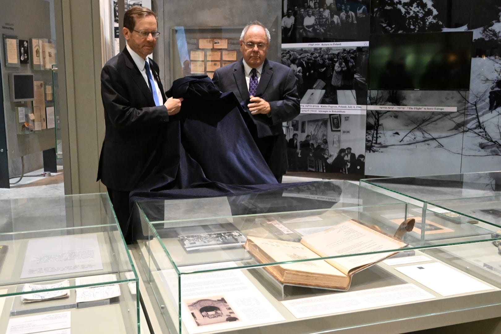 Herzog gives Talmud volume that survived the Holocaust to Yad Vashem