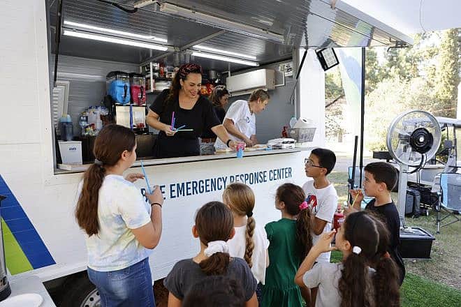 International Fellowship of Christians and Jews president Yael Eckstein at an emergency distribution center set up to help Israelis during the war against Hamas. Photo by Guy Yehieli.