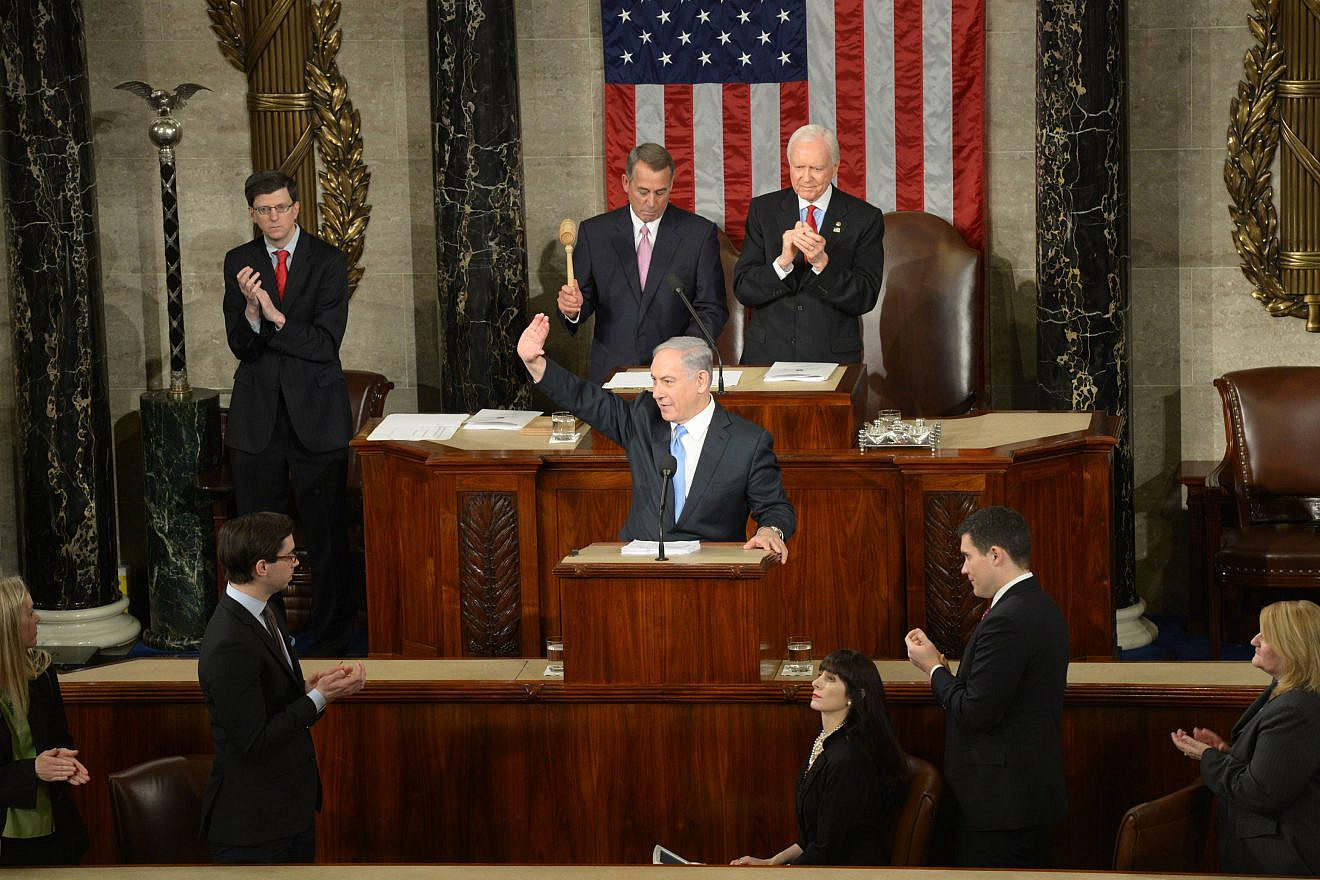 Israeli Prime Minister Benjamin Netanyahu waves to the crowd during his address to a joint session of Congress in Washington, March 3, 2015. Photo by Amos Ben Gershom/GPO.